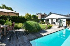 Hauptbild Einfamilienhaus mit Gartenparadies und Pool